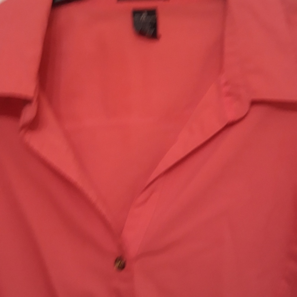 Pink w/gold buttons top.